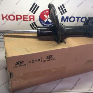 Стойка амортизатора передняя Kia Carnival (левая)