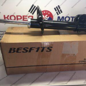 Стойка амортизатора передняя Kia Sorento 2009 - (левая)