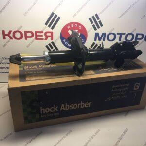 Стойка амортизатора задняя Kia Spectra (правая)