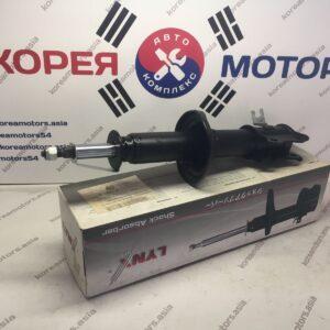 Стойка амортизатора передняя Kia Rio (левая)