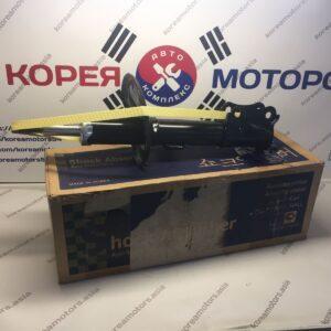 Стойка амортизатора передняя Chevrolet Aveo (левая)