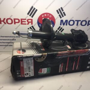 Стойка амортизатора задняя Kia Spectra (правая)