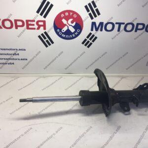 Стойка амортизатора передняя Kia Cerato 2006 - (левая)