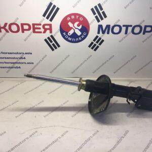 Стойка амортизатора передняя Kia Sephia (правая)