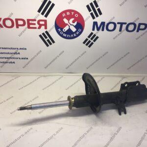 Стойка амортизатора передняя Kia Seрhia (левая)