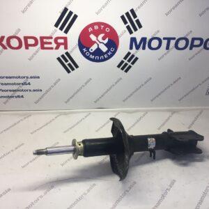 Стойка амортизатора задняя Kia Seрhia (левая)