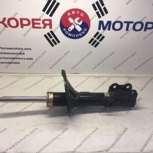 Стойка амортизатора передняя Kia Carens (правая)